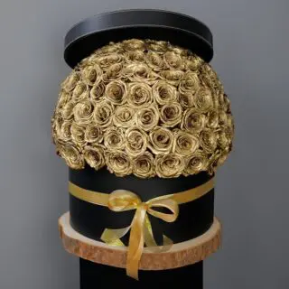 Golden Sprayed Roses In A Black Box