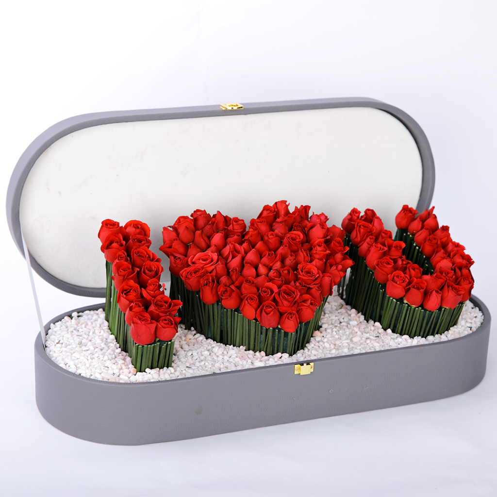 02 "I ❤️ U" arrangement featuring delicate baby roses, stylish steel grass, and elegant white stones, all beautifully presented in a charming box.