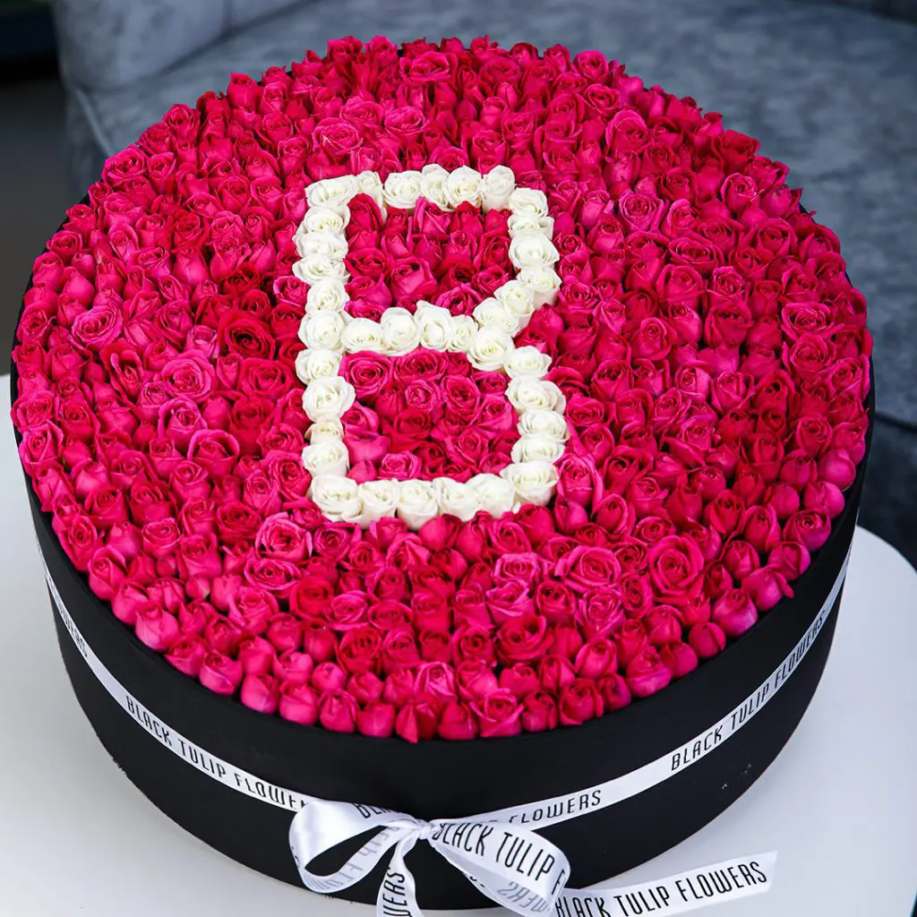 Brilliant Round Arrangement by Black Tulip Flowers