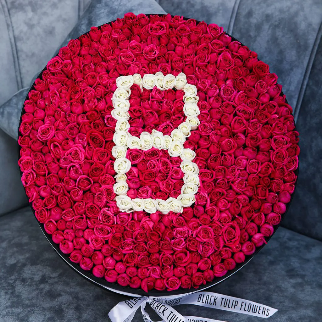 Brilliant Round Arrangement by Black Tulip Flowers