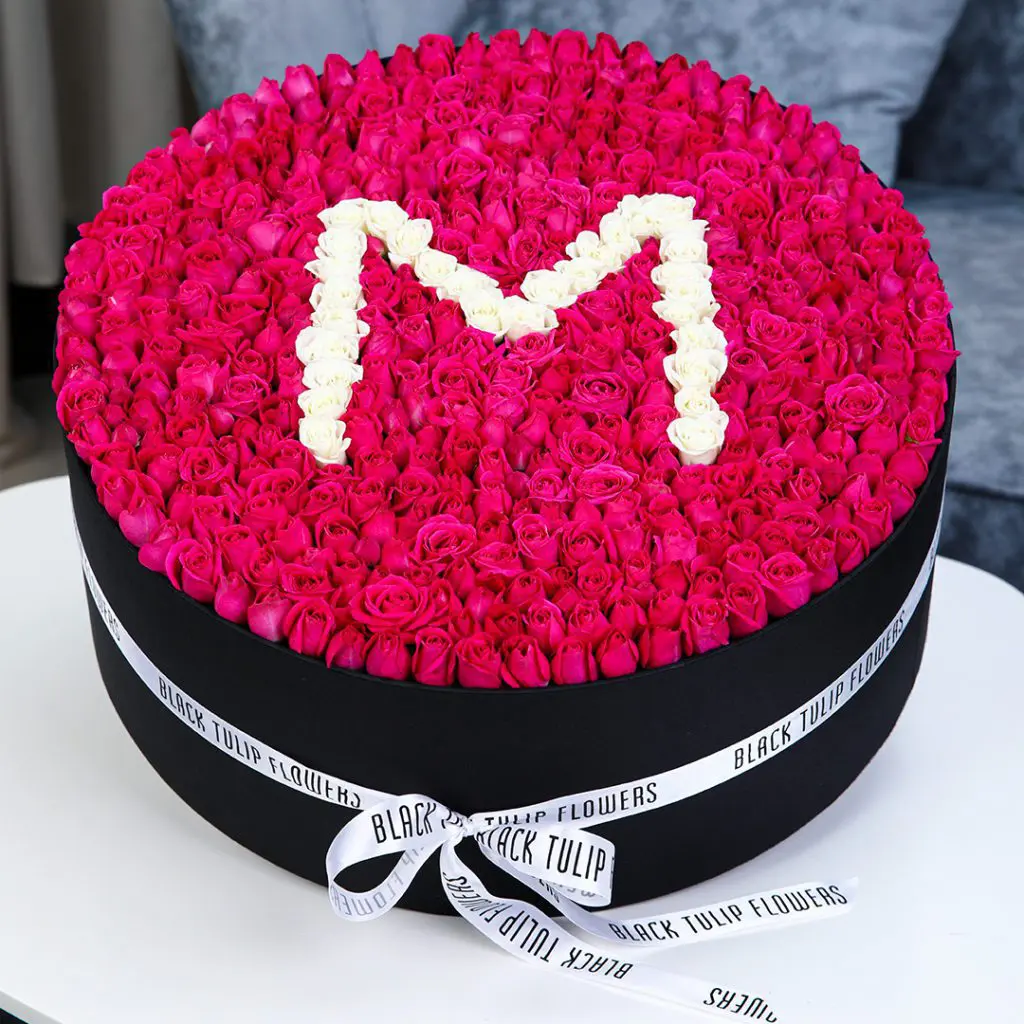 Marvelous Round Arrangement in a Box (1) Marvelous Round Red Rose Box Arrangement With Letter M in White