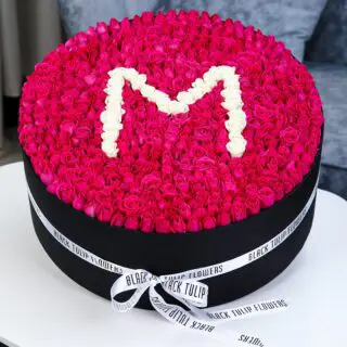 Marvelous Round Red Rose Box Arrangement With Letter M in White