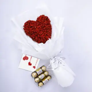 Pure Heart Surprise flower bouquet with ferrero rocher chocolate by Black Tulip Flowers.