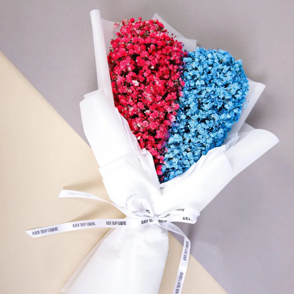 Rare Duo (2) Rare Duo bouquet composed with of sprayed gypsophila in heart shape by Black Tulip Flowers.