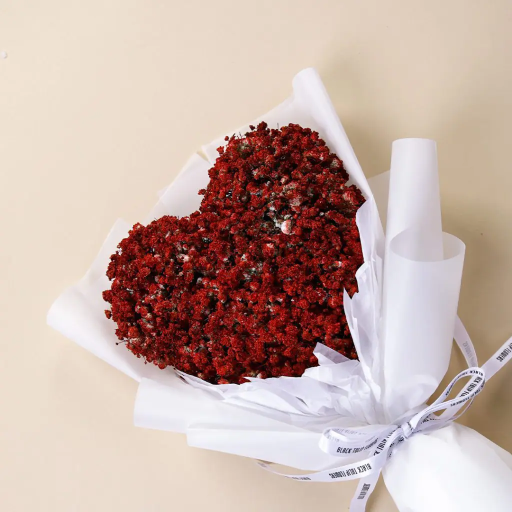 Rare Duo (3) Rare Duo bouquet composed with of sprayed gypsophila in heart shape by Black Tulip Flowers.