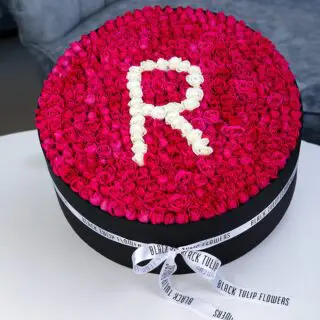 Ravishing Round Red Rose Box Arrangement With Letter R in White