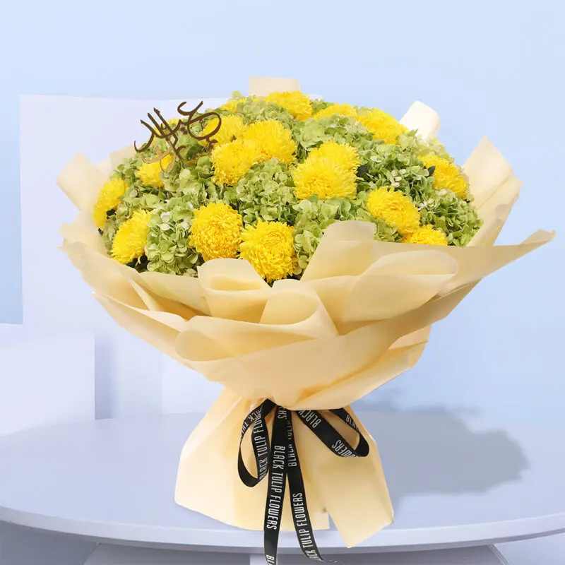 01 (10) Eid Mubarak floral arrangement with yellow chrysanthemums and green hydrangeas
