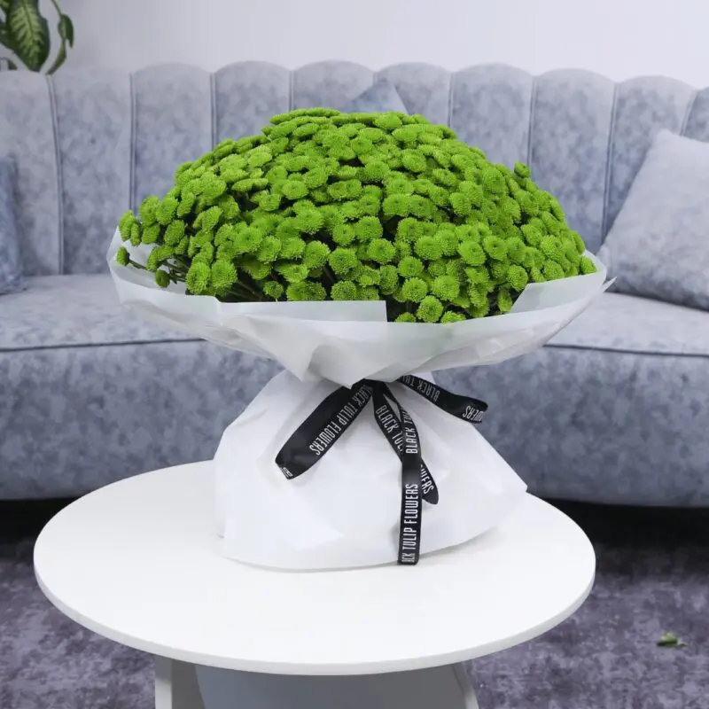 Green Toggle Blooms (1) green chrysanthemum bouquet on a white table
