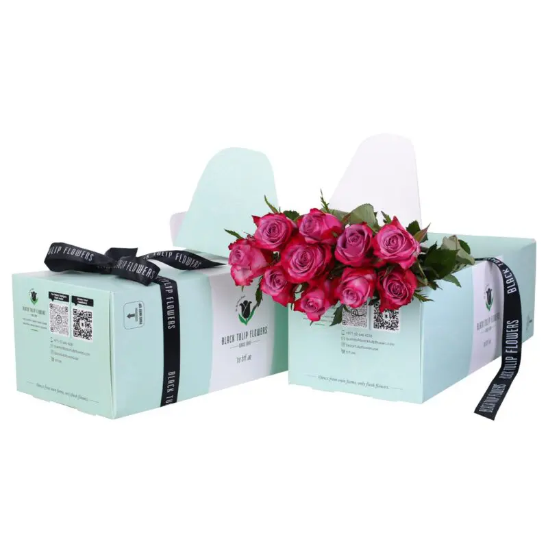 Purple Rose - Green Box (1) 10 stems of rich purple roses beautifully presented in a green box with flower food tied with a black ribbon.