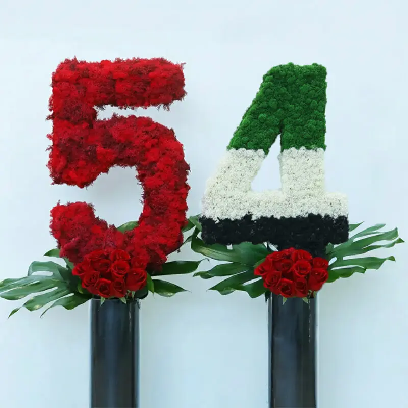 Majestic 54rd Celebration-01 he number 54th UAE national day creation using flag color flowers