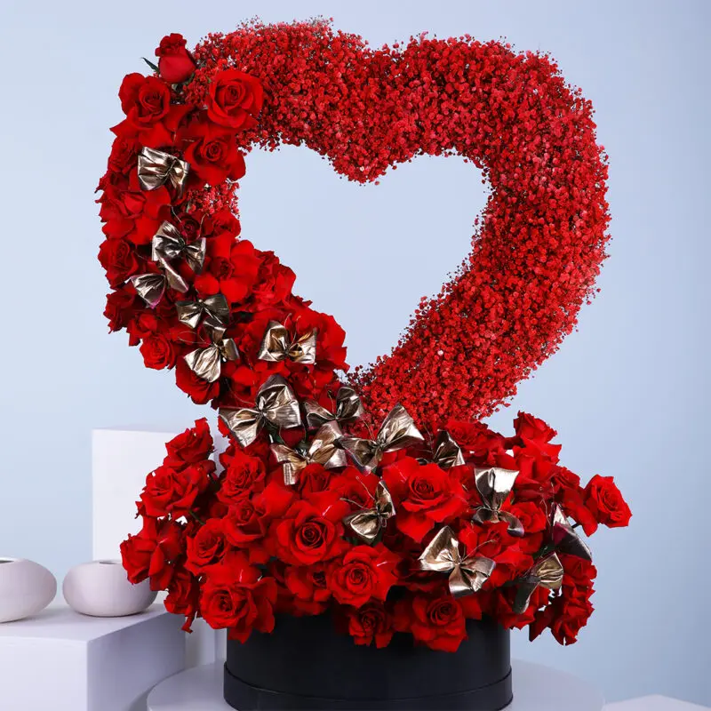 01 Standing heart shape deep love flower box arrangement, featuring red roses, and red sprayed gypsophilla in a black box.
