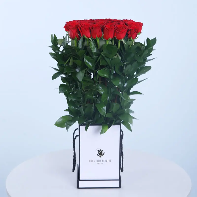 Timeless Red Roses 15 Stem Red Roses arranged in a stylish bag.