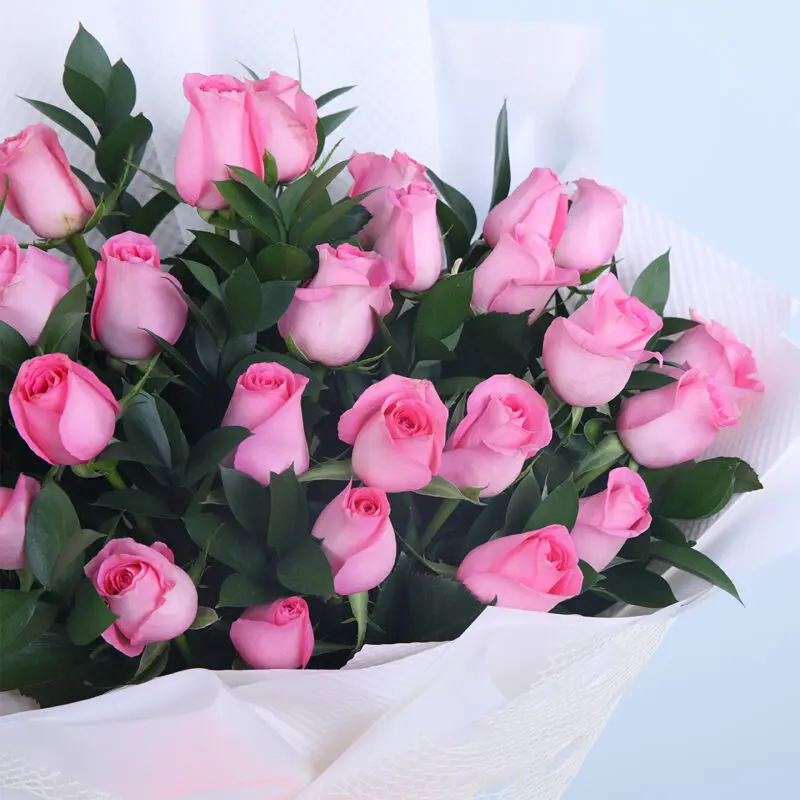 03 - Pretty Pink Rose Bouquet 30 pink roses bouquet wrapped in chic white with green leaves.