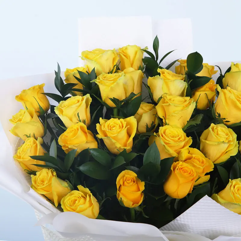 03 - Golden Glow Roses Cheerful Bouquet of 30 yellow roses with green leaves.