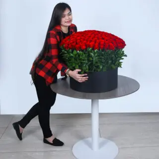 Luxurious 200 rose and leaves arrangement in an elegant black box.