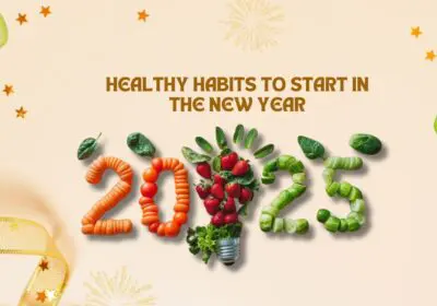 healthy habits for the new year. The numbers "2025" are formed using various fruits and vegetables, symbolizing healthy eating. There are also dumbbells and sneakers in the image, representing physical activity. The background has a festive feel with fireworks and stars.
