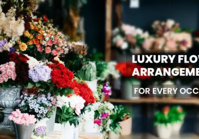 Elegant luxury flower arrangement featuring premium roses, orchids, and lilies in a stylish vase—perfect for weddings, anniversaries, or upscale events.