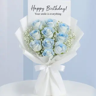 A vibrant bouquet of blue roses arranged for a happy birthday celebration