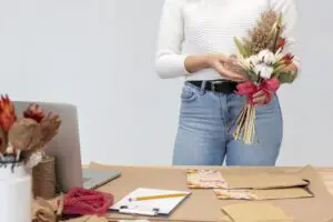 young female florist owning flower shop