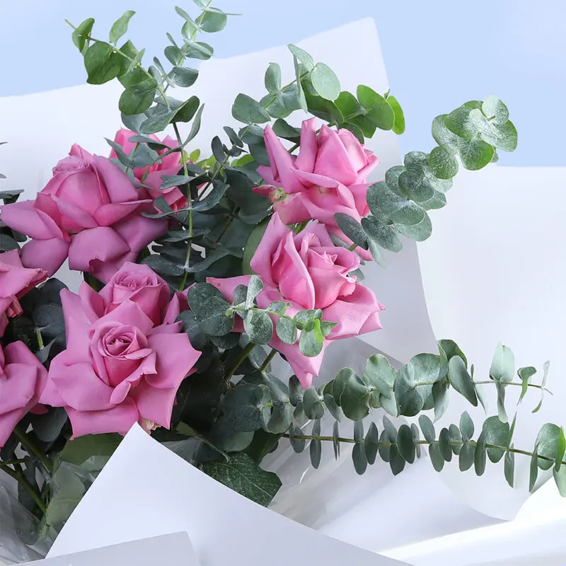 purple-roses-&-eucalyptus-bouquet_2026_02 purple roses eucalyptus bouquet 2026 02