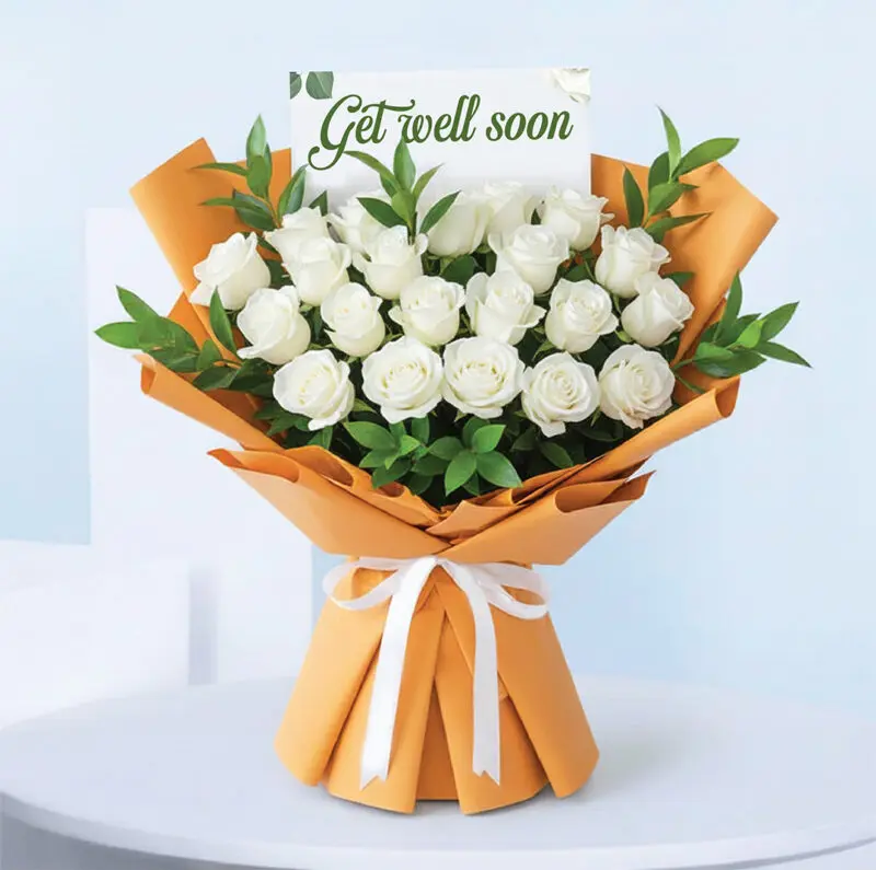 get-well-soon-white-rose-bouquet_01 Get well soon bouquet with 20 white roses in peach-orange wrap.