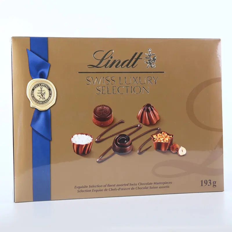 Lindt Swiss Luxury Selection 193g box of assorted Swiss chocolates with blue ribbon and gold packaging.
