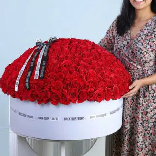 Valentines Day Home 68 Premium valentines day rose box featuring 400 vibrant red roses in an extra-large round white box, finished with a ribbon.