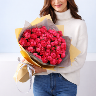 Bouquet featuring 20 Bombastic pink roses in premium wrapping.