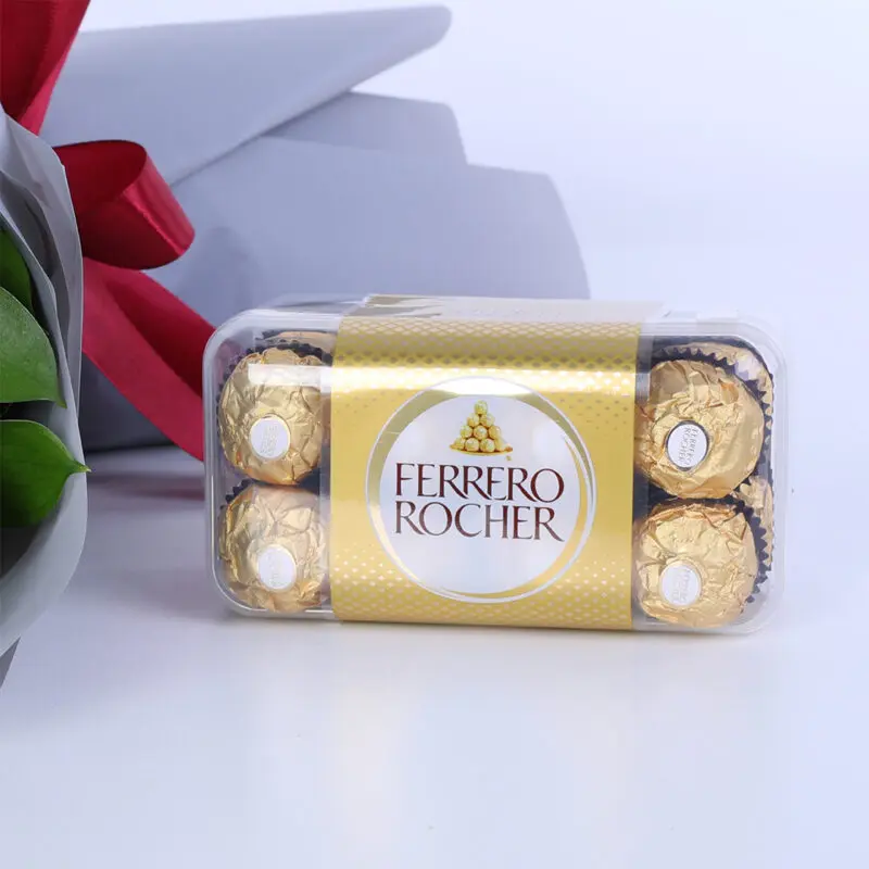 red-and-white-rose-ferrero_02 Bouquet of 14 red roses, 1 white rose, ruscus leaves and Ferrero Rocher chocolates in a grey wrap with a red ribbon.