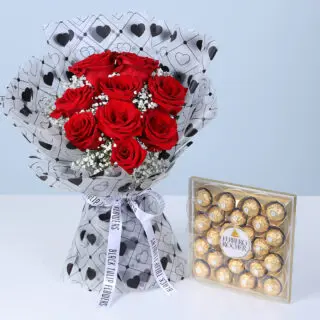 Valentines Day Home 52 Red roses and baby’s breath bouquet in a heart-patterned white wrap, with a premium Ferrero chocolate box for Valentine’s Day.