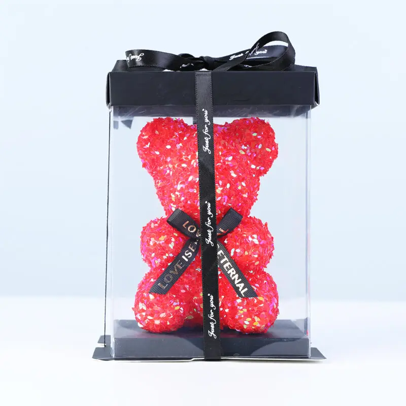 rose-teddy-gift-box Red rose teddy bear in transparent gift box, finished with a black ribbon.