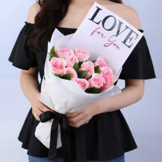 Valentines Day Home 36 Pink roses and greenery in elegant white wrapping, finished with a "LOVE For You" message card.