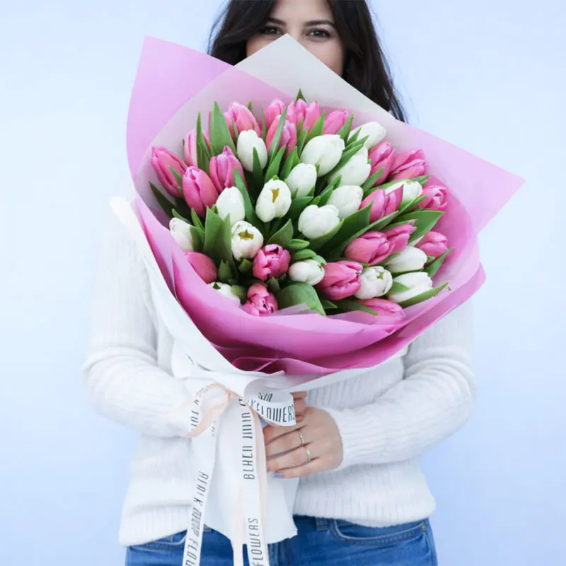 pink-white-tulip-bouquet-40-stems 20 pink tulips and 20 white tulips in pink wrapping, finished with a white ribbon bow.