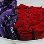 box_of_red_roses_with_dairy_milk_chocolate.png