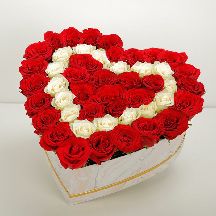 Engaging Roses In A Heart Marbled Box Delivery in Dubai, UAE