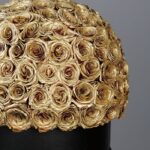 golden_sprayed_roses_in_a_black_box_2_1.png