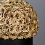 golden_sprayed_roses_in_a_black_box_2_1.png