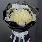 hand_bouquet_of_white_roses.png