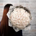 hand_wrapped_cream_roses_2_.jpg