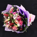 mix_flowers_in_purple_wrapping.jpg