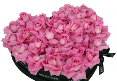 perfect pink roses in heart shaped box