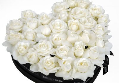 perfect white roses in heart shaped box