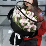 pink_white_tulips_in_black_wrap.jpg