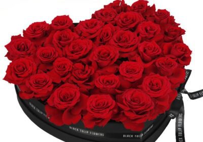 red roses in heart shaped box