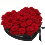 red_roses_in_heart_shaped_box.jpg