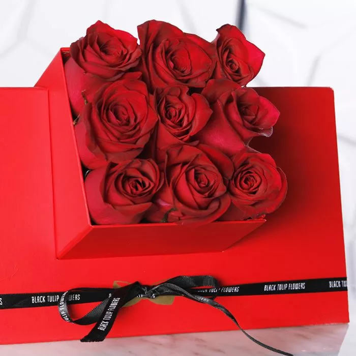 red roses in red cube box 2 jpg