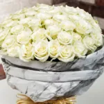 white_roses_in_marbled_wrapping_2_.jpg