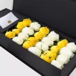 white_yellow_roses_in_black_box_1.jpg