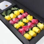 yellow_deep_purple_roses_in_black_box_1.jpg