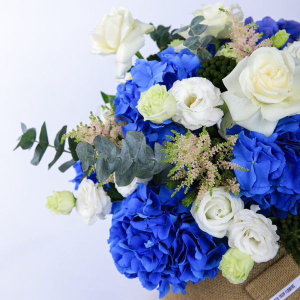 Azure and Ivory flower box by Black Tulip Flowers.
